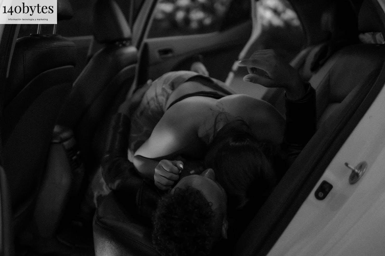 A Couple Erotic Moment Inside the Car's Backseat
