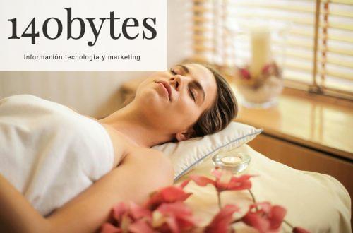 Woman in Wrapped in White Towel Lying on Bed with Eyes Closed