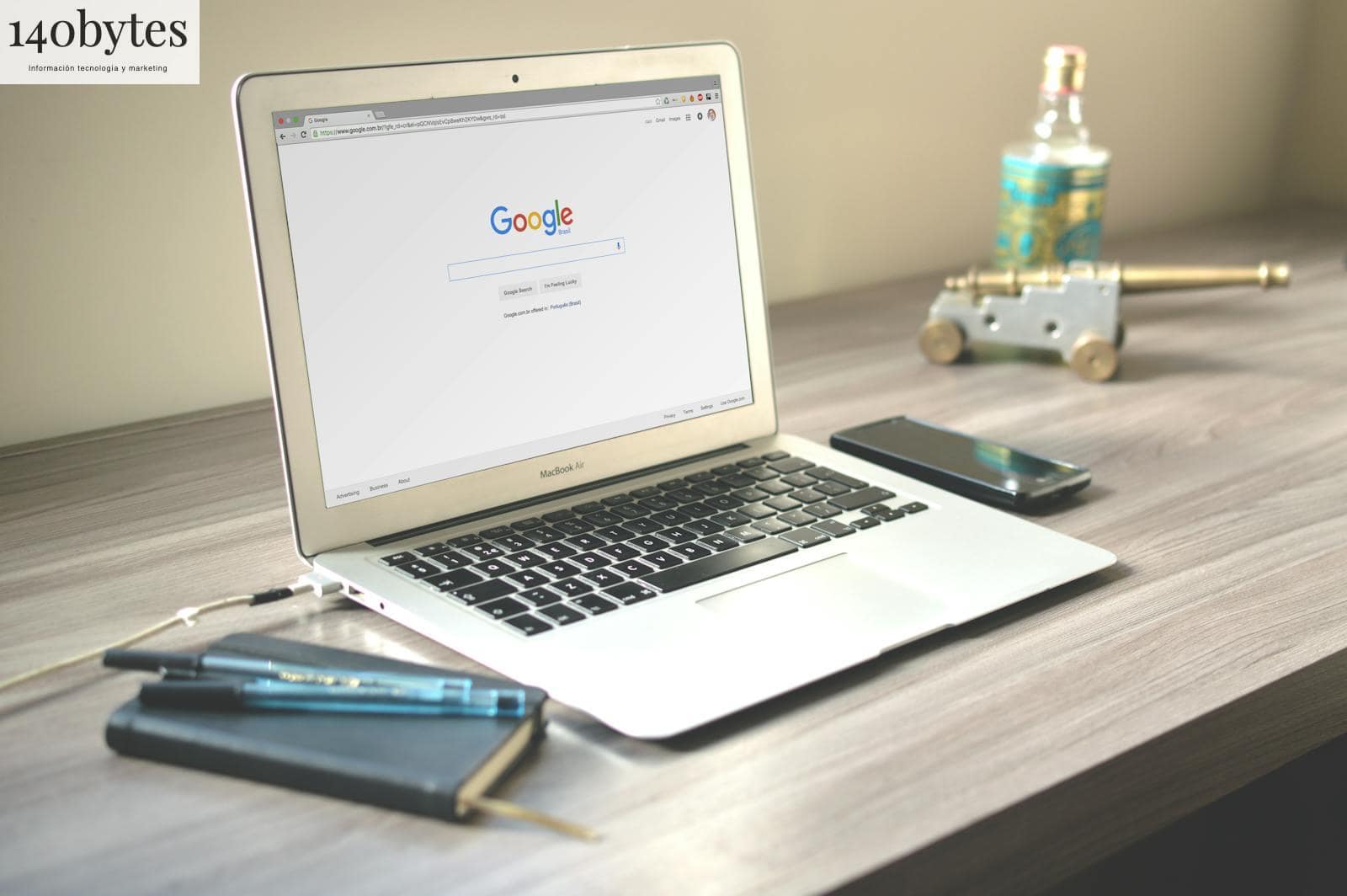 Macbook Air on Grey Wooden Table