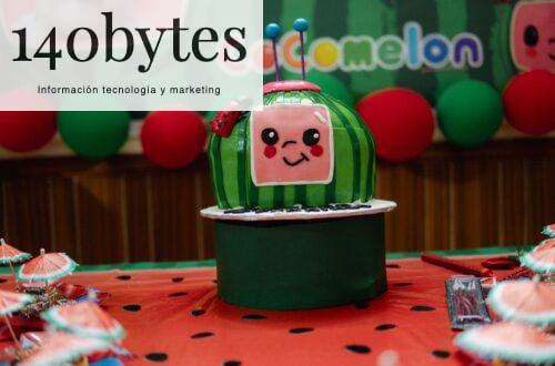 A cocomelon themed cake is displayed
